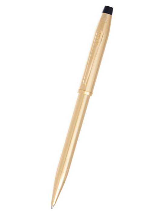 Gold pen with a black cap on a white background